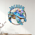 Floral sea turtle wall sign displayed on a light paneled wall as colorful coastal decor