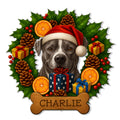 Custom pit bull metal sign featuring a Santa hat, gifts, holly, pinecones, oranges, and a bone-shaped accent