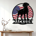 Patriotic black Lab metal sign displayed on a light wall above a rustic console table