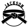 Close-up view of a black karate belt design cut into a decorative metal sign