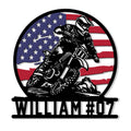 Custom motocross metal sign featuring a helmeted dirt bike rider racing against a patriotic American flag background