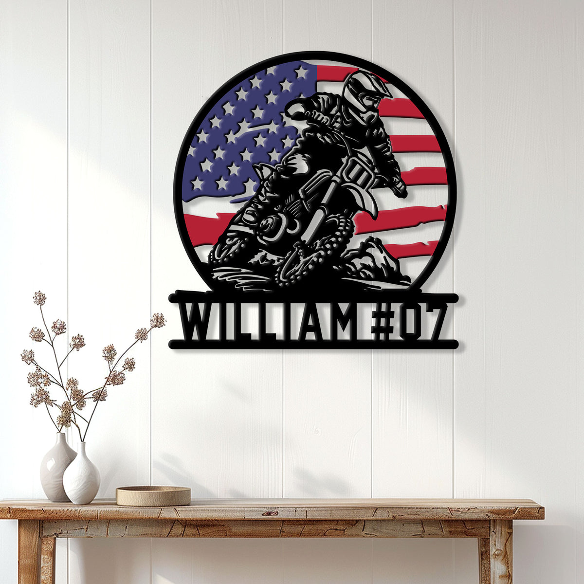 Patriotic motocross metal sign displayed as garage or home wall decor above a console table
