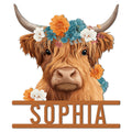 Floral Highland cow metal sign featuring a shaggy brown cow portrait with curved horns and colorful flowers
