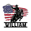 Patriotic cowboy on a rearing horse with a lasso and American flag design on a metal sign