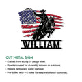 Cut metal cowboy sign featuring a horseback rancher, lasso, rearing horse, and distressed American flag