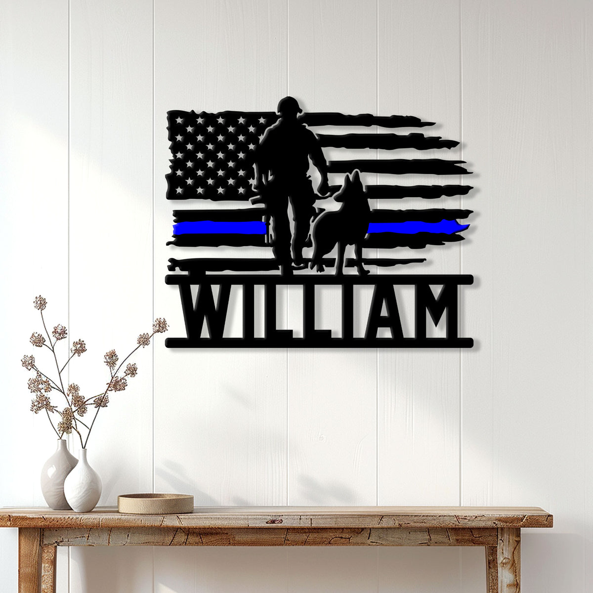 Police K9 metal wall sign displayed above a console table in a bright home interior