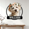 Floral Schnoodle wall sign displayed on a white paneled wall above a console table