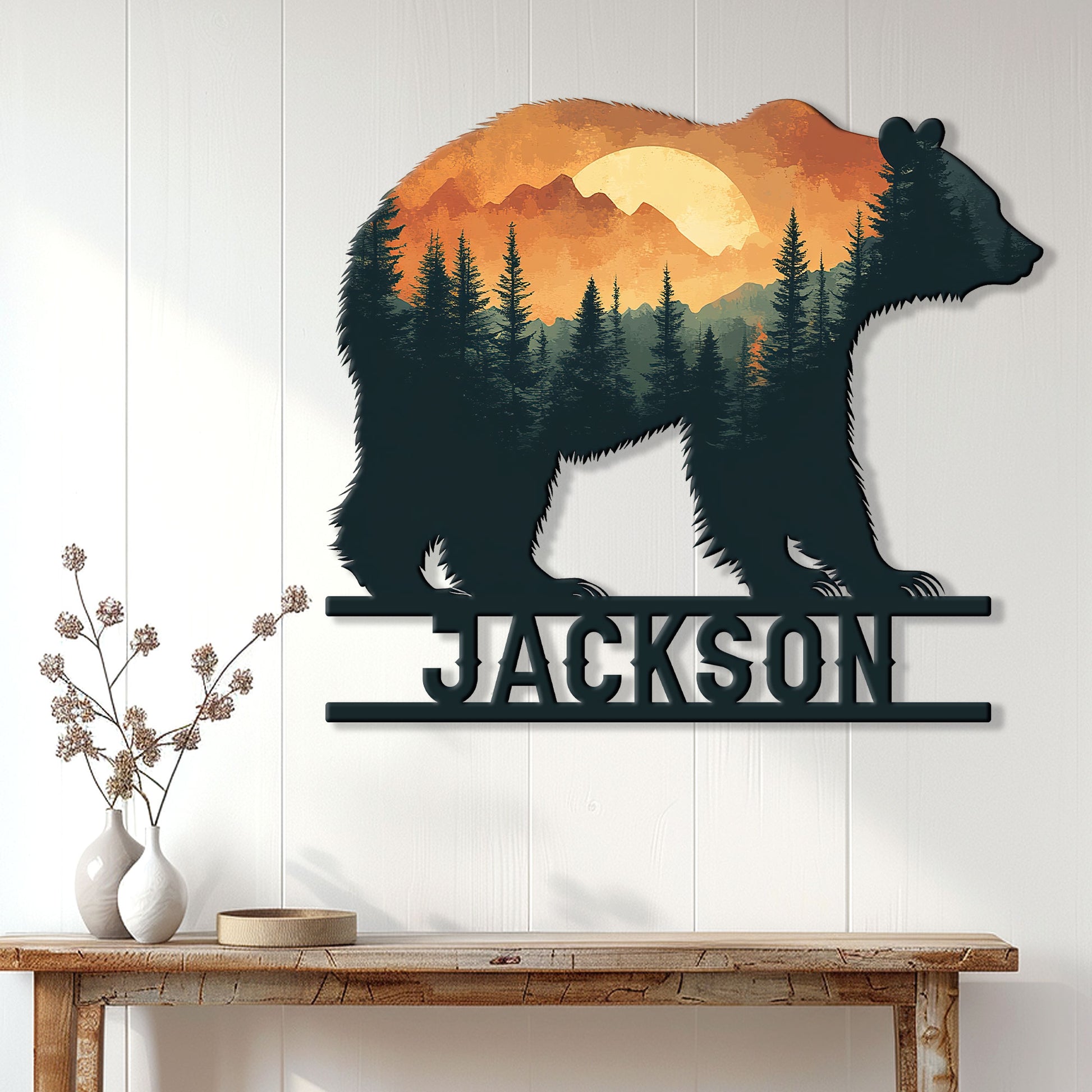 Bear silhouette metal wall sign displayed above a console table in a bright rustic home