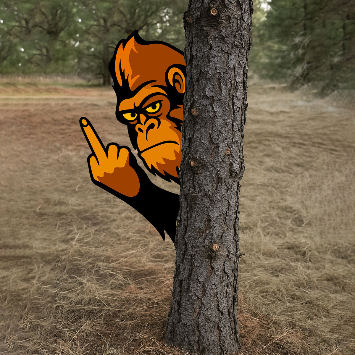Gorilla metal sign displayed beside a tree in a wooded outdoor setting