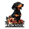 Floral Dachshund metal sign featuring a black and tan wiener dog surrounded by colorful flowers
