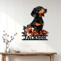 Floral Dachshund metal wall sign displayed on a light paneled wall above a wood console table