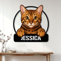 Bengal cat wall sign displayed on a white paneled wall above a console table