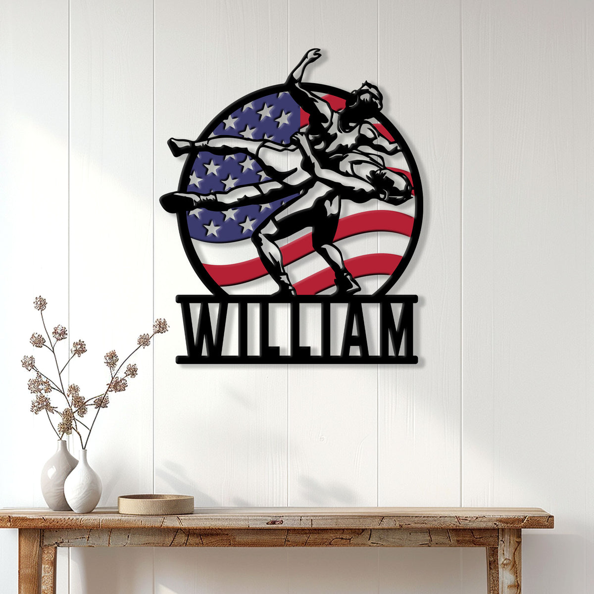 Patriotic wrestling wall sign displayed on a white paneled wall above a wood console table