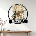 Floral cockatiel metal wall sign displayed above a console table in a bright home entryway