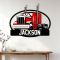 Red semi truck wall sign displayed as trucker decor above a rustic wood console