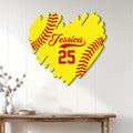 Softball glove metal sign displayed on a white paneled wall in a home setting