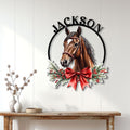 Horse wall sign displayed on a white paneled wall above a rustic console table