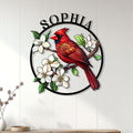 Cardinal wall sign displayed on a light wood-paneled wall above a console table