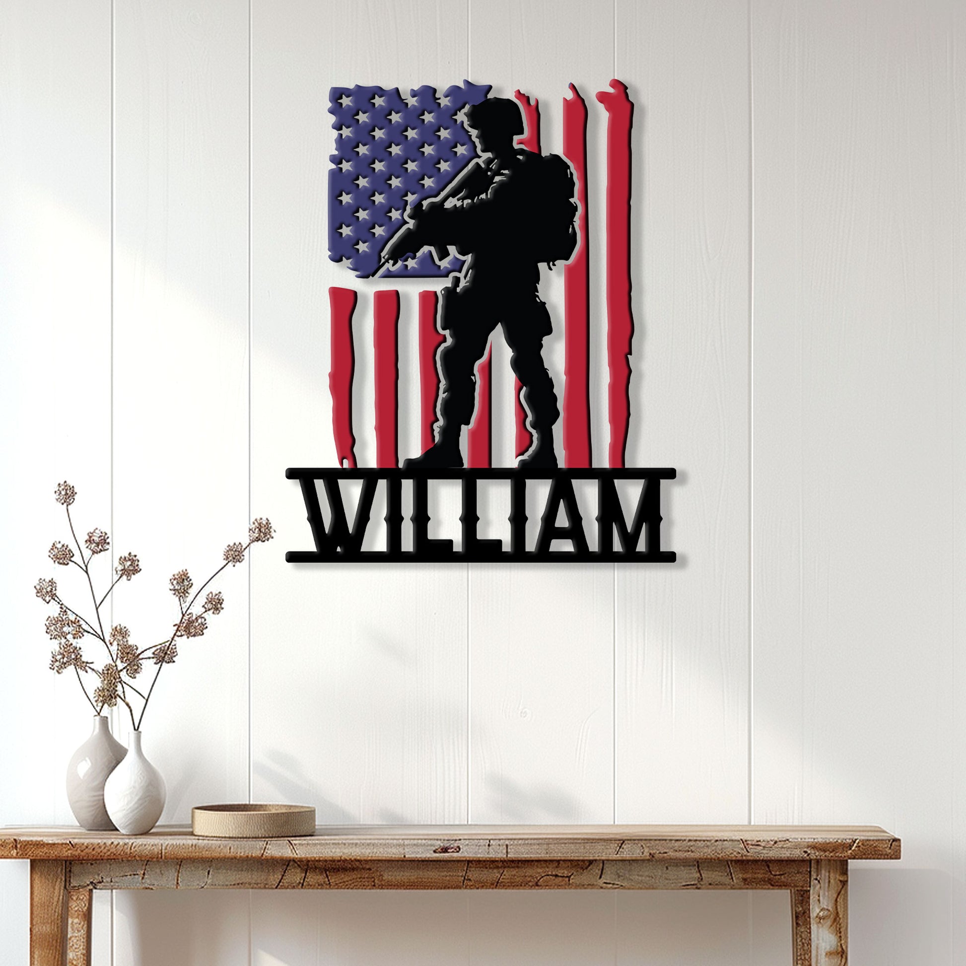 Patriotic military wall decor displayed on a white paneled wall above a console table
