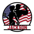 Fitness couple lifting weights against a patriotic flag backdrop on a custom gym metal sign