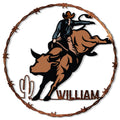 Rodeo metal sign featuring a bull rider in motion within a barbed wire circle and western ranch design