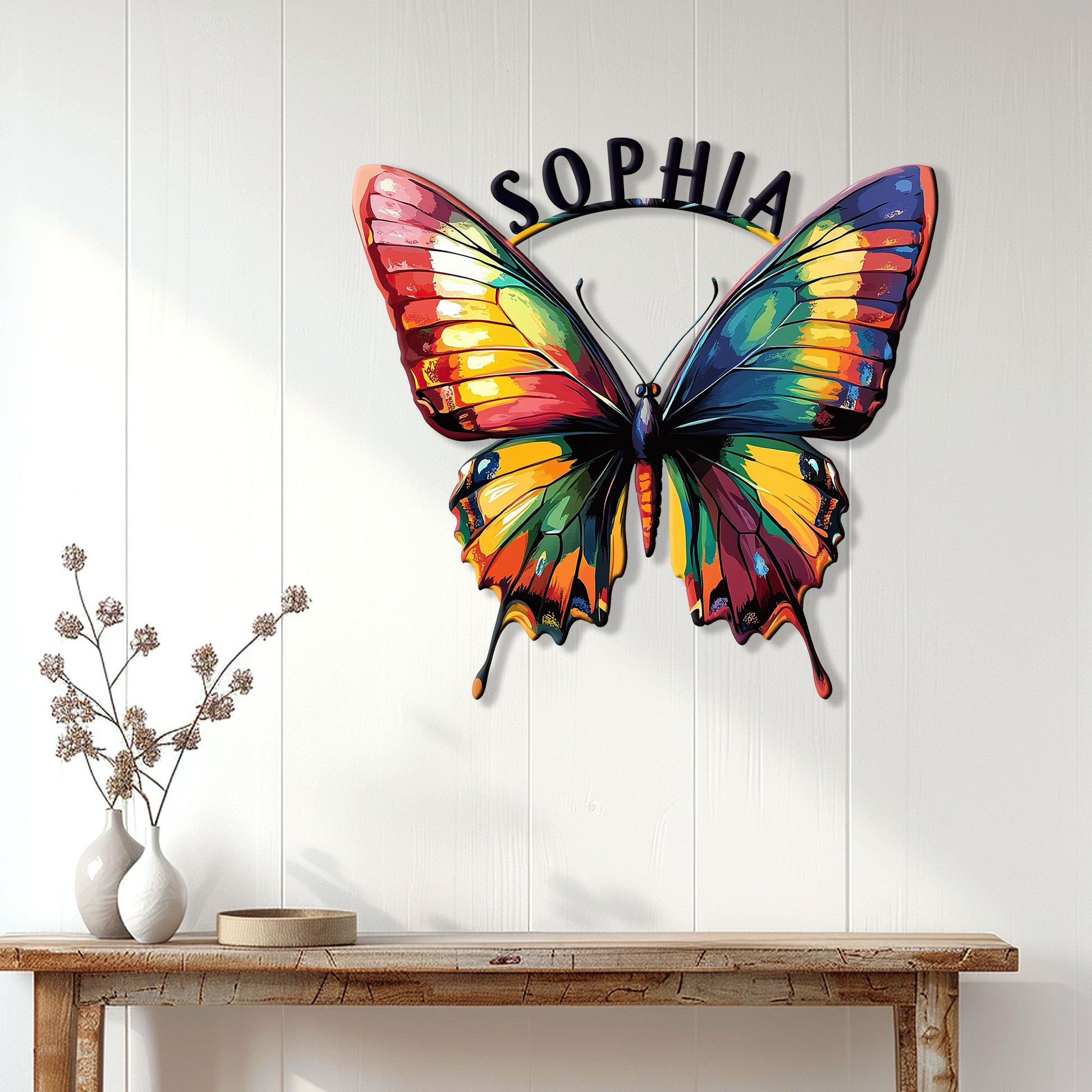 Colorful butterfly metal wall sign displayed on a light paneled wall above a wooden console table