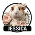 Floral guinea pig metal sign featuring a close-up brown and white cavy framed by flowers