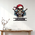 Pirate skull and crossed swords metal sign displayed on a white paneled wall above a console table