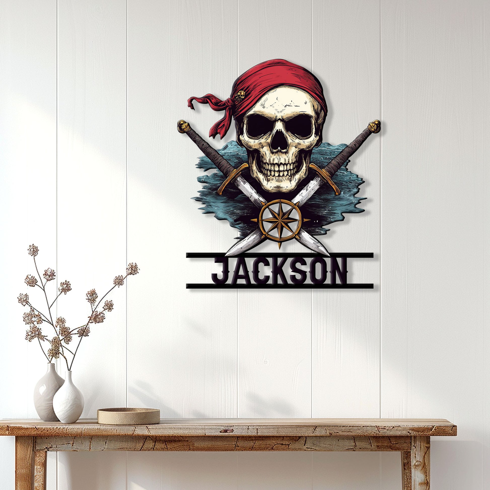 Pirate skull and crossed swords metal sign displayed on a white paneled wall above a console table