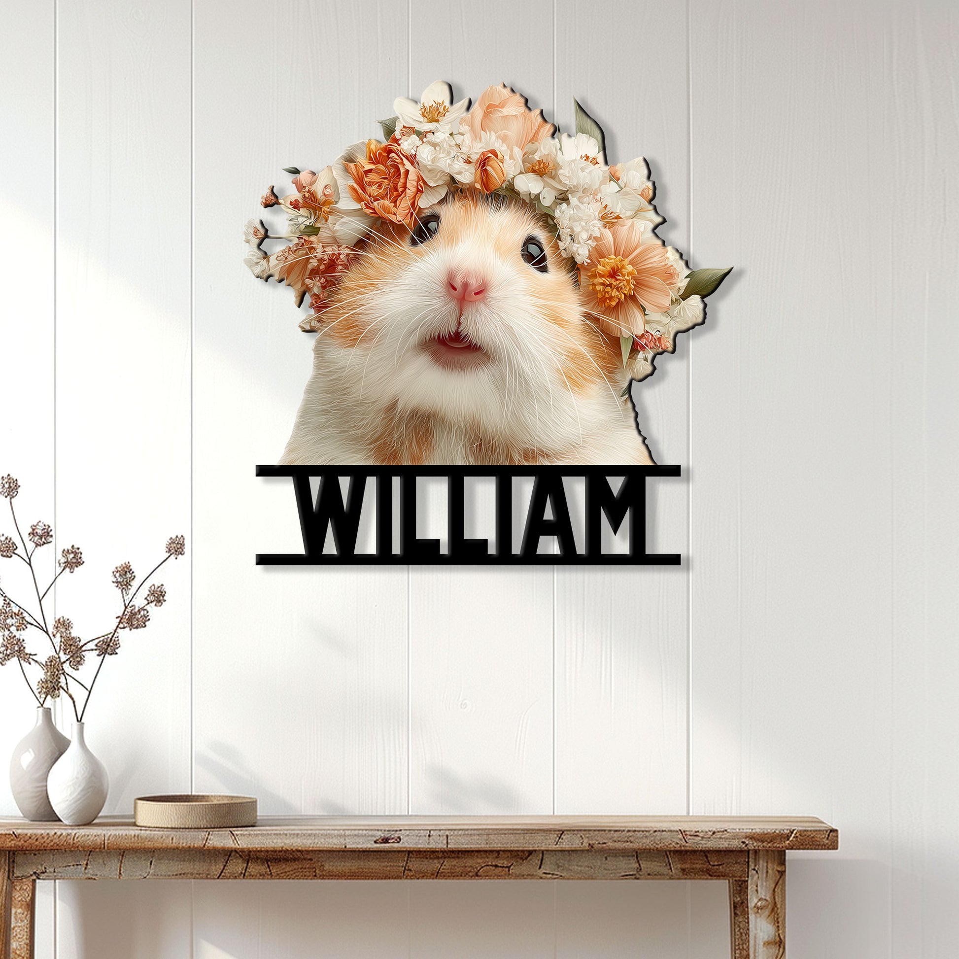 Floral hamster metal sign displayed on a light paneled wall above a console table in a bright home