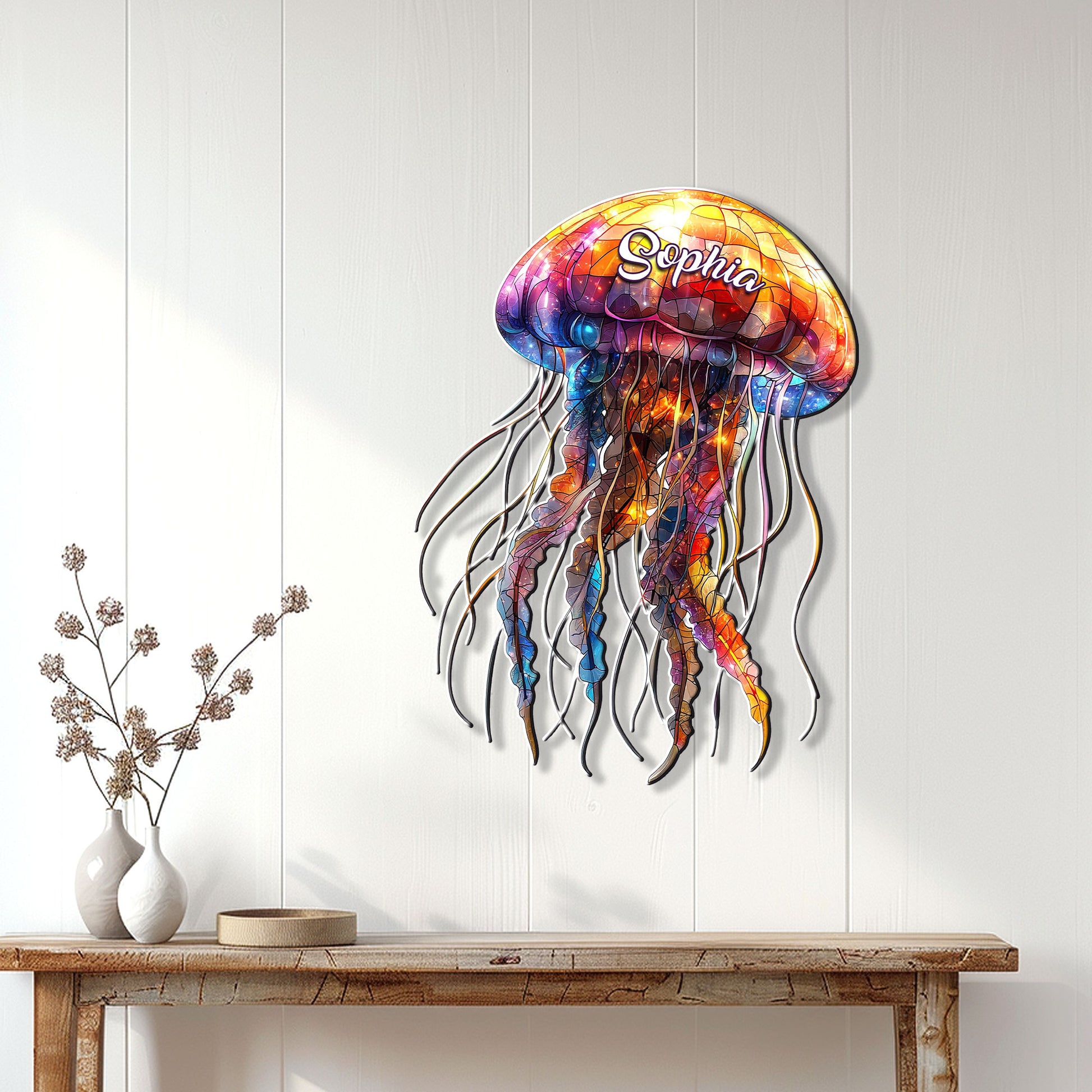 Colorful jellyfish wall sign displayed above a console table in a bright coastal-inspired room