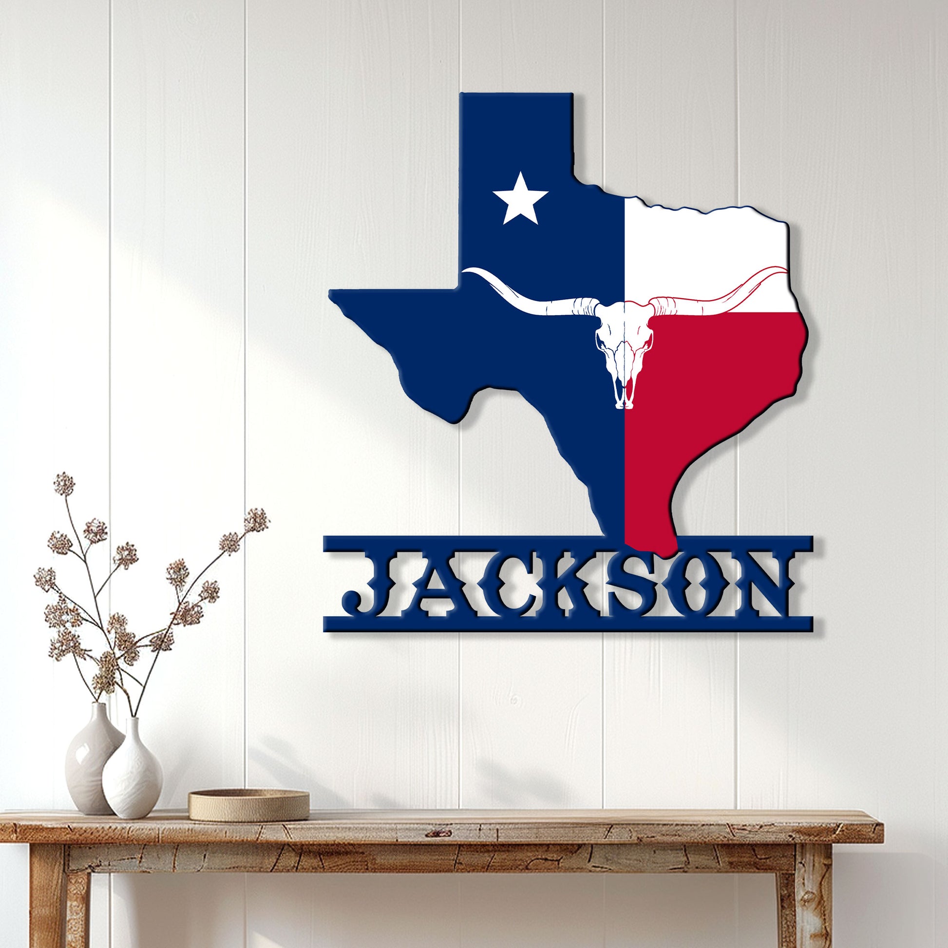 Texas longhorn wall sign displayed above a rustic console table in a bright farmhouse-style room