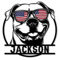 Patriotic pitbull metal sign featuring a bold dog portrait wearing American flag sunglasses