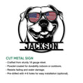 Front product view of a patriotic pitbull cut metal sign with a bold sunglasses-wearing dog design