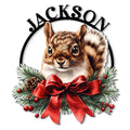 Custom squirrel metal sign featuring a woodland squirrel framed by evergreen branches, pinecones, berries, and a red bow