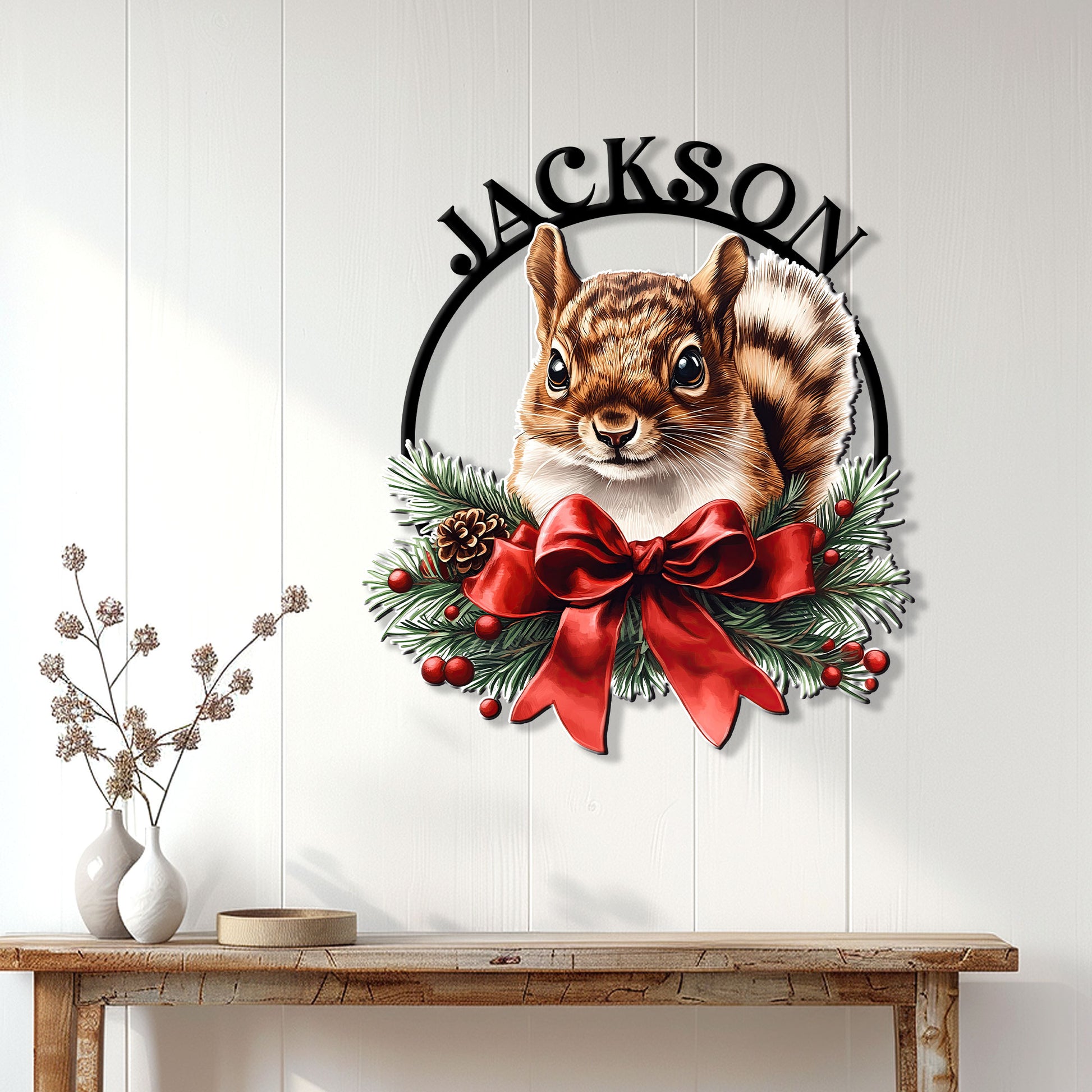 Squirrel Christmas metal sign displayed on a light wood wall above a console table