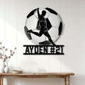 Soccer wall sign displayed on a light paneled wall above a console table