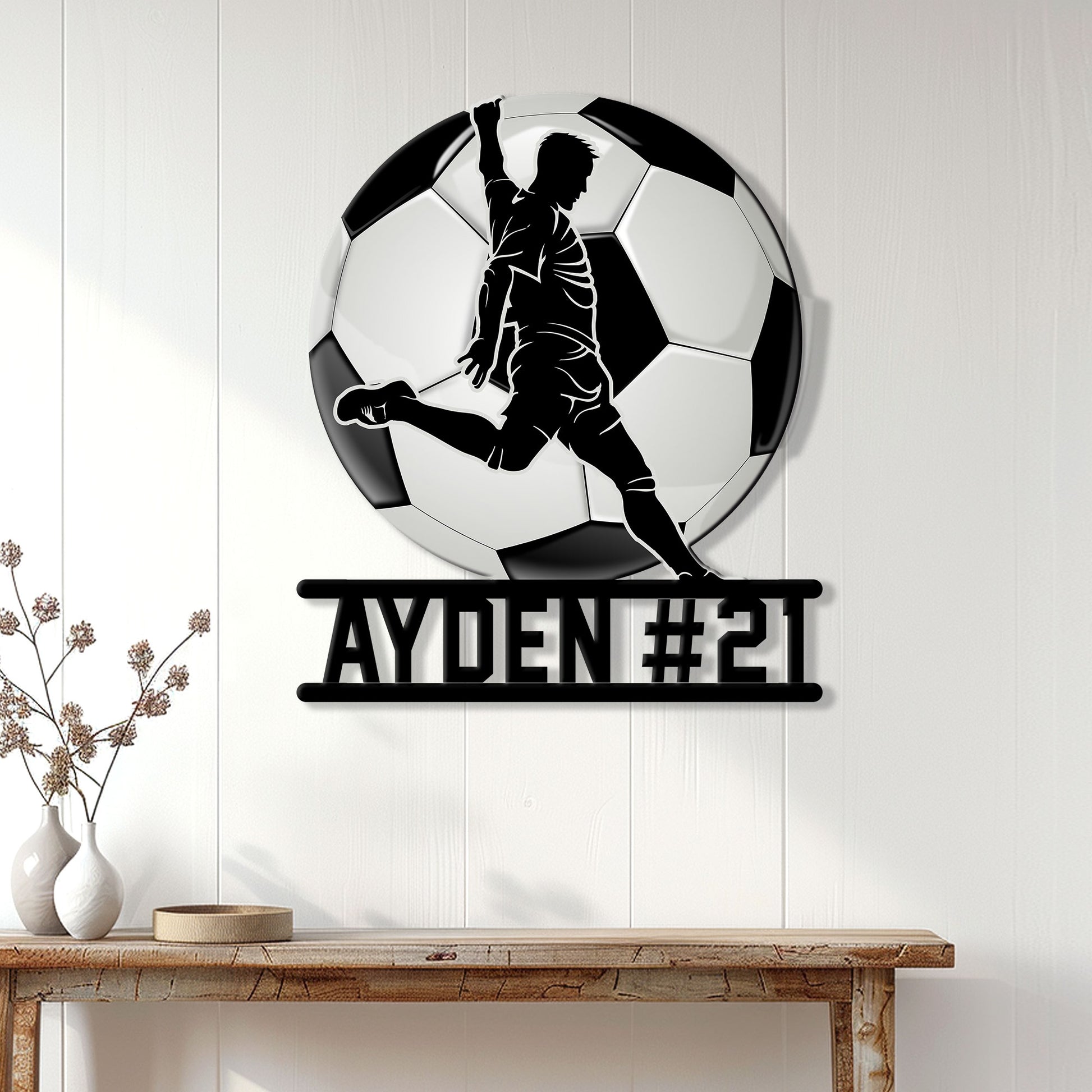 Soccer wall sign displayed on a light paneled wall above a console table