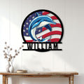 Patriotic dolphin wall sign displayed as coastal decor above a console table in a bright home