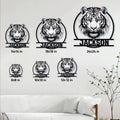 Tiger metal wall sign shown in multiple size options above a contemporary living room sofa