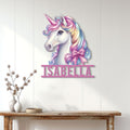 Pastel unicorn metal wall sign displayed above a console table in a bright modern room