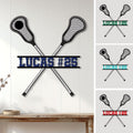 Custom lacrosse metal sign displayed on a white wall, featuring crossed sticks and bold athletic lettering