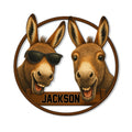 Custom donkey metal sign featuring two cheerful donkey faces, including one wearing sunglasses in a rustic wood-style frame