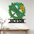 Colorful floral dragonfly wall sign displayed on a bright paneled wall above a console table