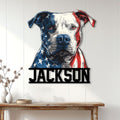 Staffordshire Bull Terrier metal wall sign displayed in a bright home entryway with a bold patriotic portrait