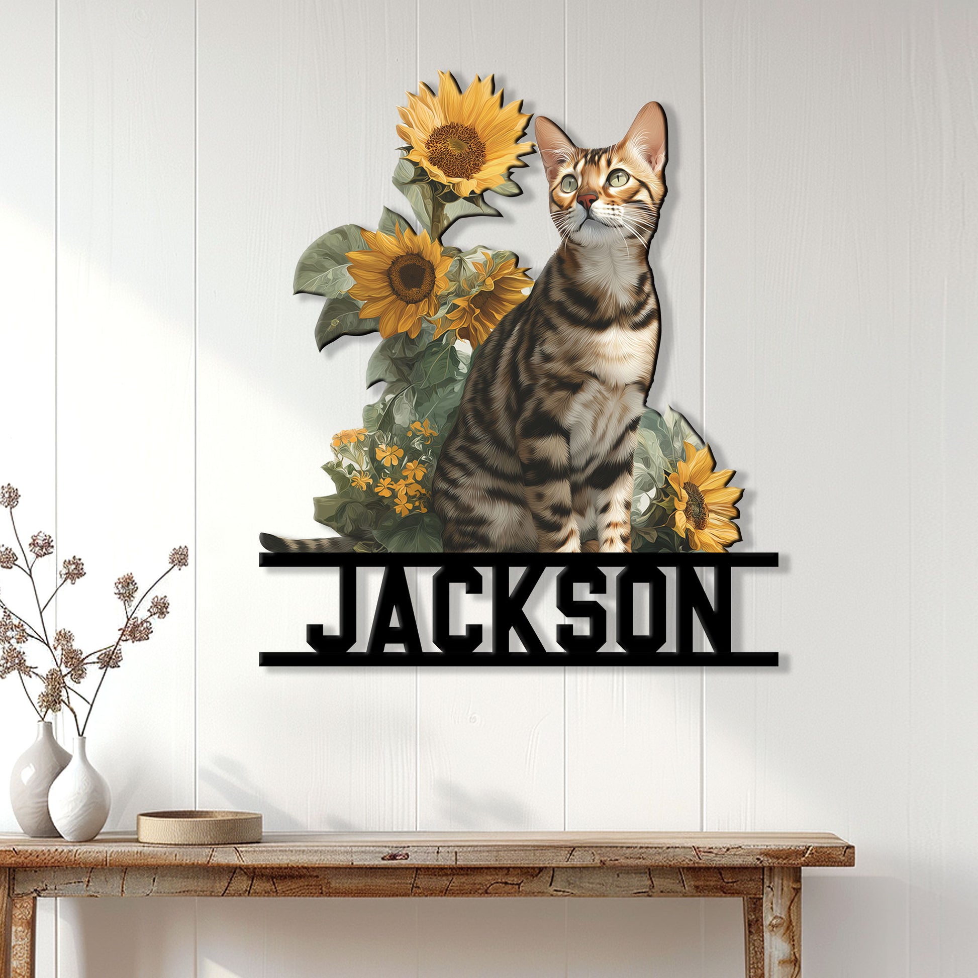 Bengal cat wall sign displayed on a light paneled wall above a console table with sunflower artwork