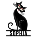 Stylized black cat metal sign with curled tail, striking eyes, and a sleek sitting silhouette