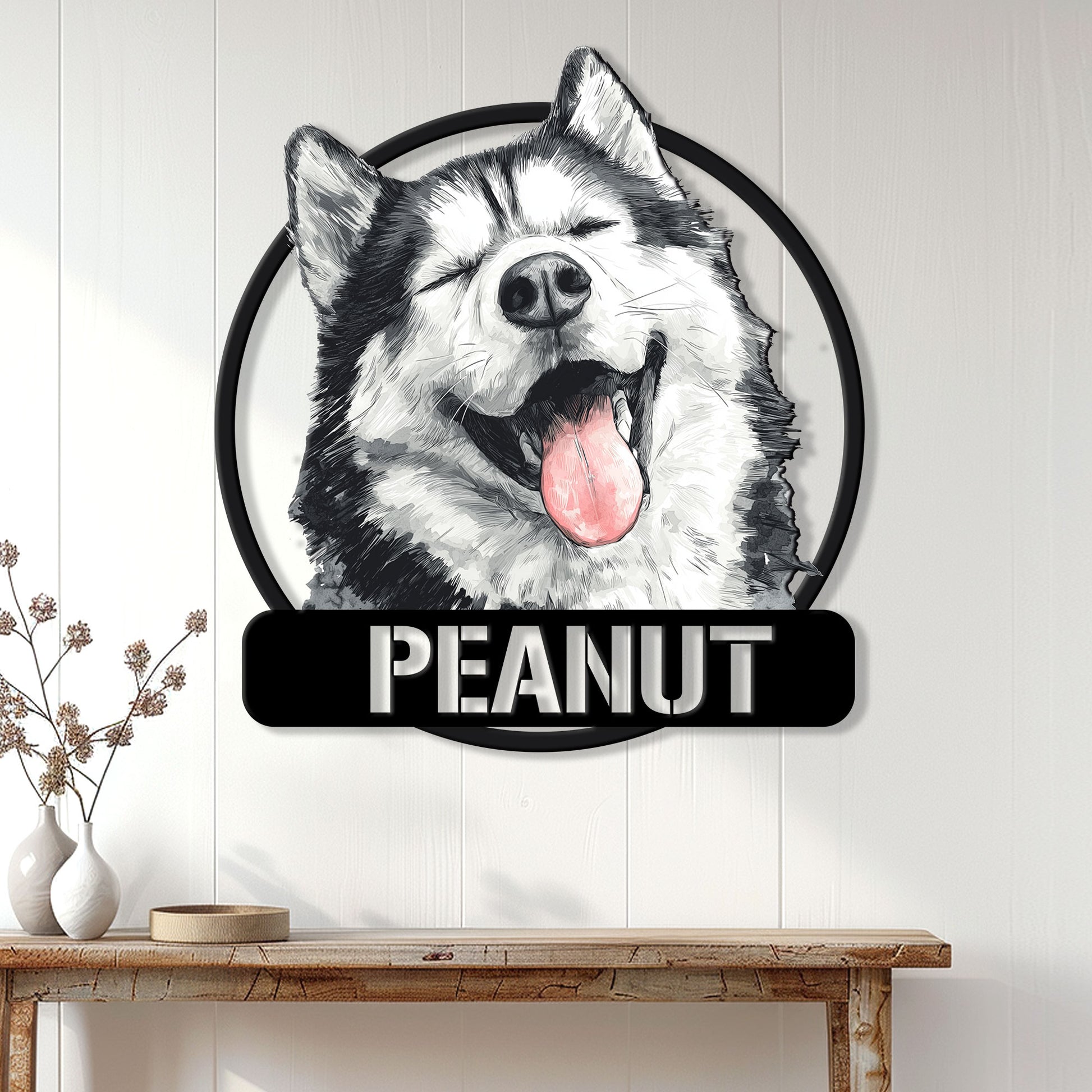 Alaskan Malamute metal wall sign displayed above a console table in a bright home entryway