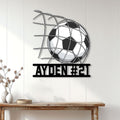 Soccer metal wall sign displayed on a bright paneled wall above a console table
