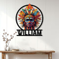 Native American-inspired feathered mask wall sign displayed above a console table in a bright home entryway